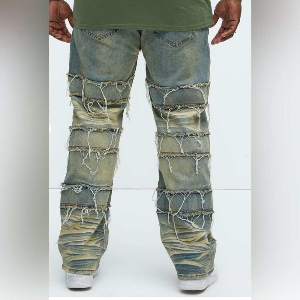 Blue Relaxed Fit Jeans with Distressed Ladder Design